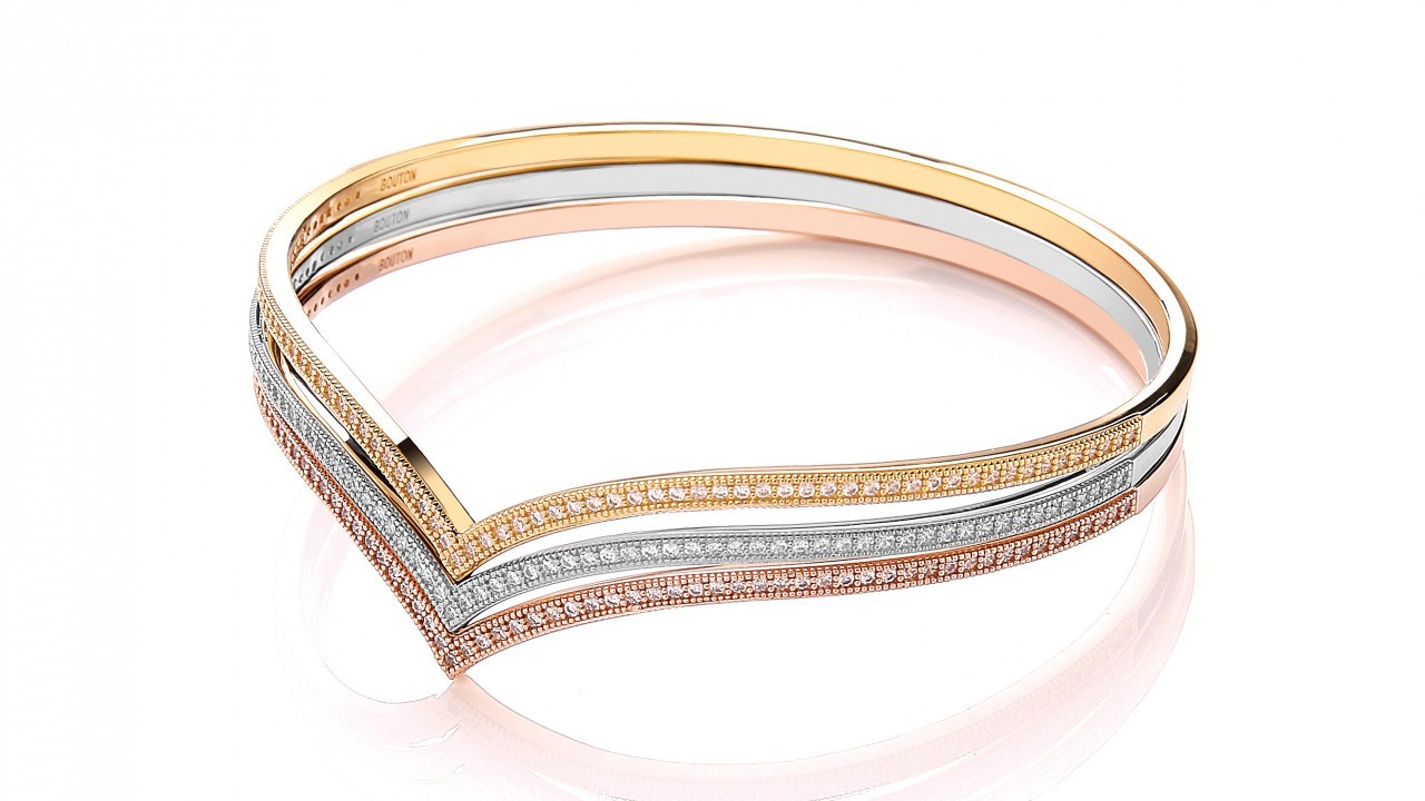 Rose gold, gold and silver bangles, £195 each