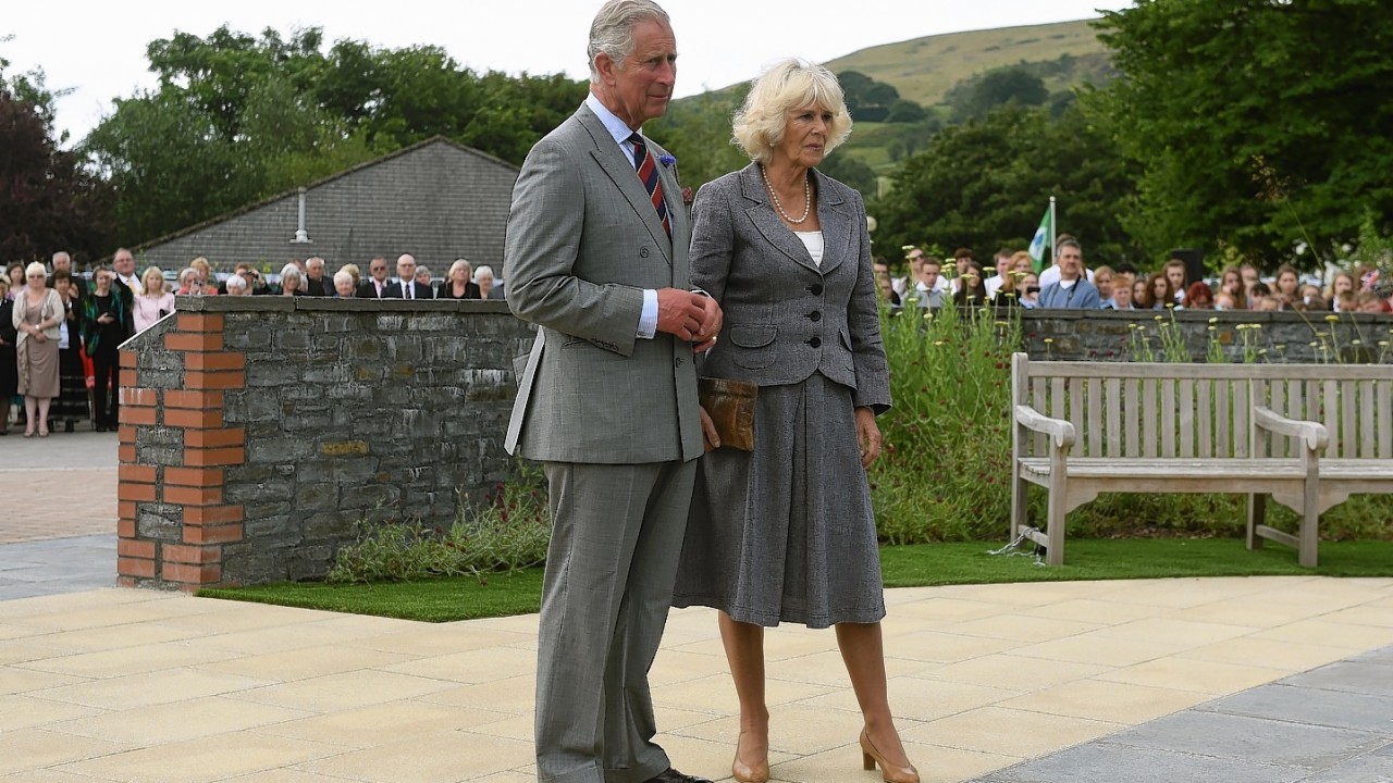 The Prince of Wales and Duchess of Cornwall lay a wreath in memory of Welsh miners killed in the collieries during a visit to the Welsh National Mining Memorial, Senghenydd