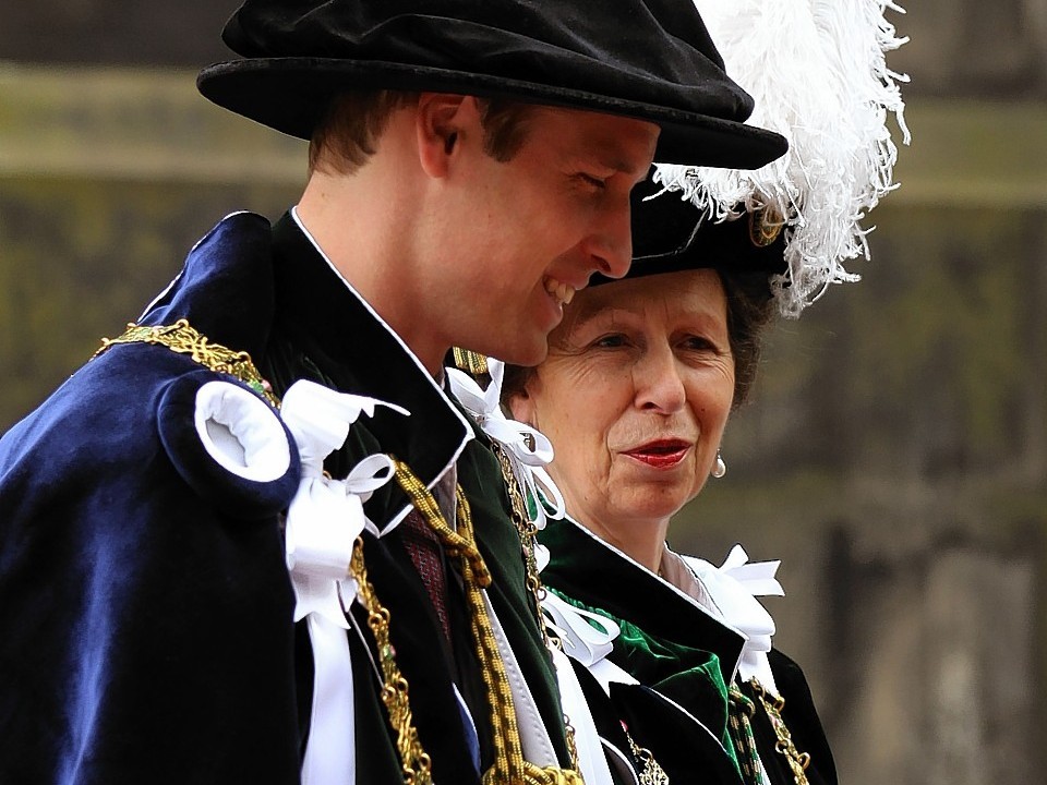 The Princess Royal and the Duke of Cambridge arrive at St Giles' Cathedral in Edinburgh as they attend the Thistle service