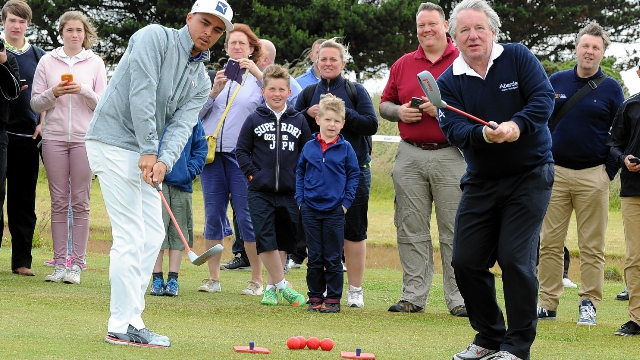 Ricky Fowler, left, with Martin Gilbert, at Murcar Golf Club, Aberdeen.