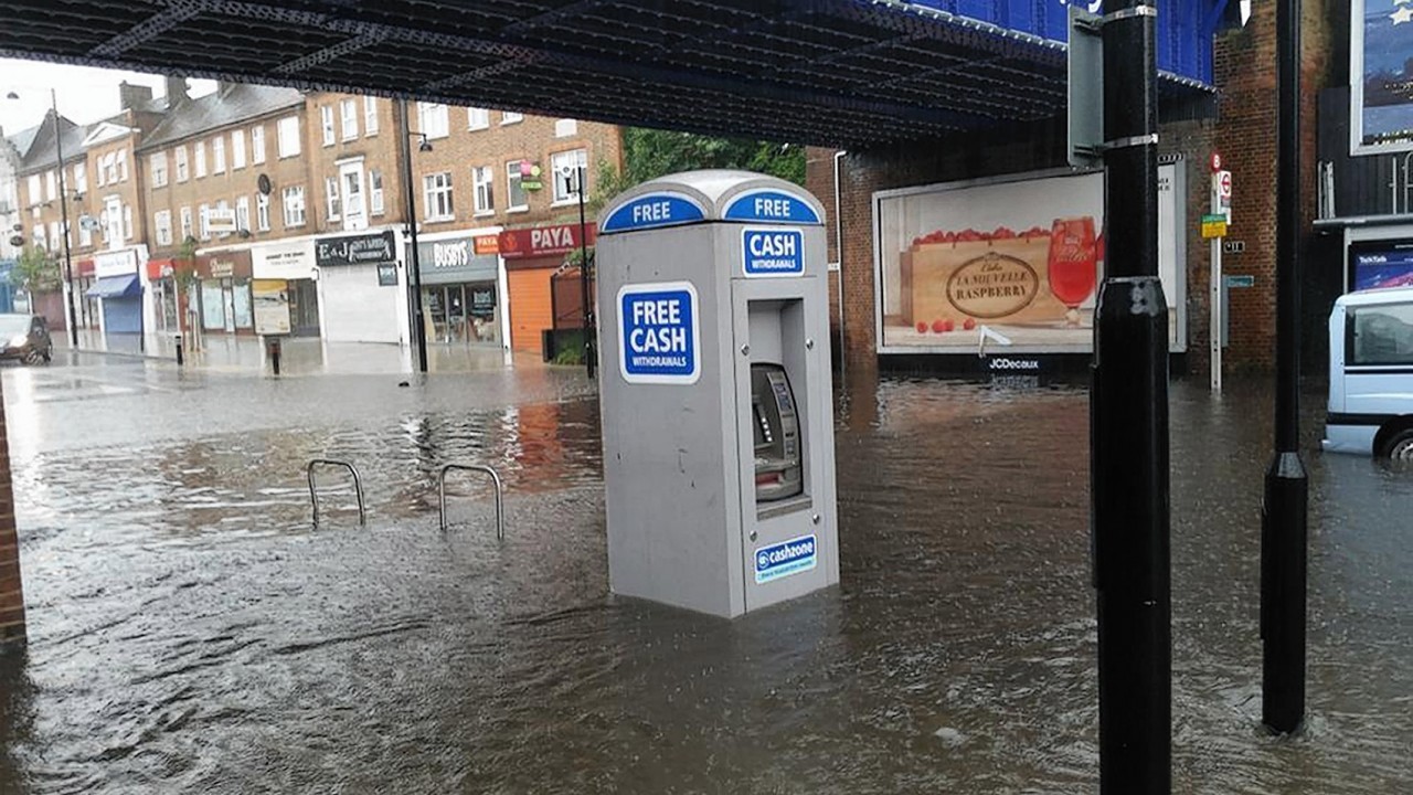 Photo taken from the Twitter feed of @souvikdash with permission of  flooding at Ruislip train station as storms hit the Hove, Brighton and Worthing areas of Sussex at the start of the morning rush-hour