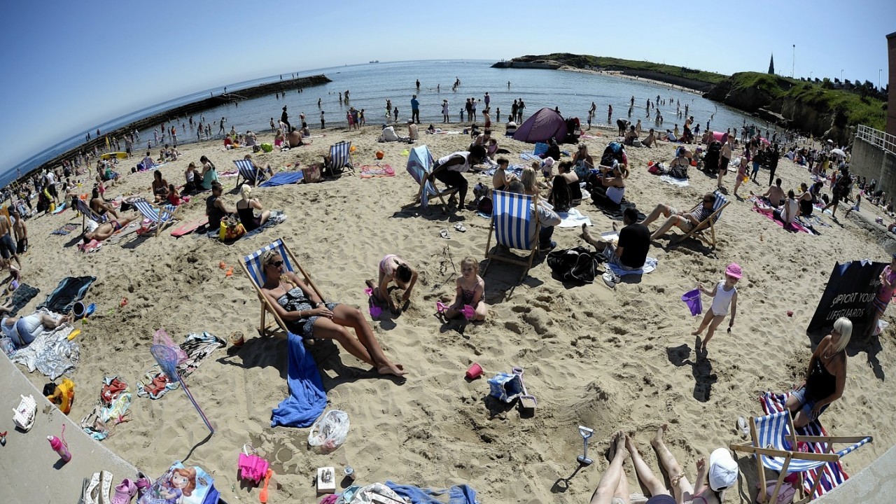 A crowded beach at Cullercoats, North Tyneside as temperatures hit the high 20s