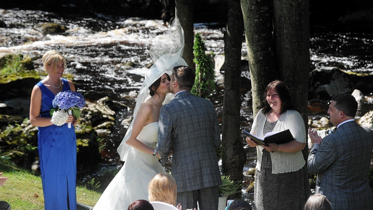 Aberdeen artist Nicole Porter married Gareth Williams at The Falls of Feugh Restaurant at Banchory. After the ceremony, Nicole unveilled a partrait