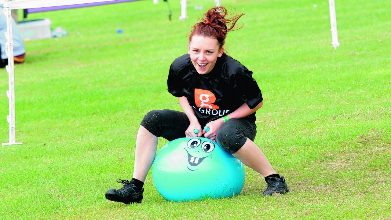 Joanna Szuster of the BG Group team competing in the space hopper race.