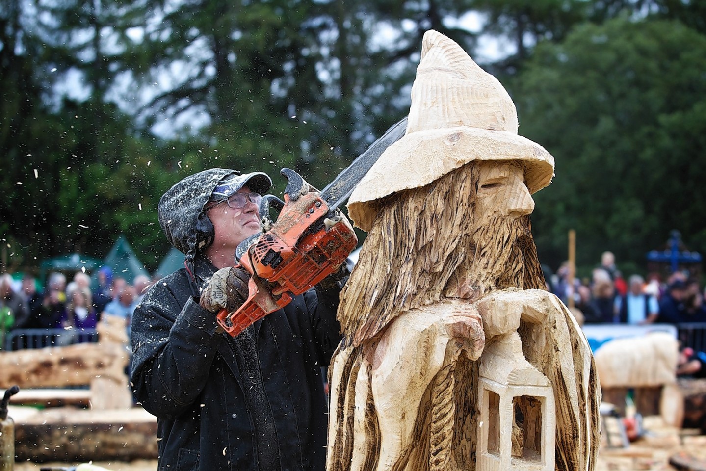 Adam Murray carves his sculpture