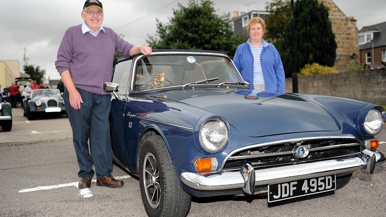 Ken and Margaret Wood and their 1966 Sunbeam Tiger V8.