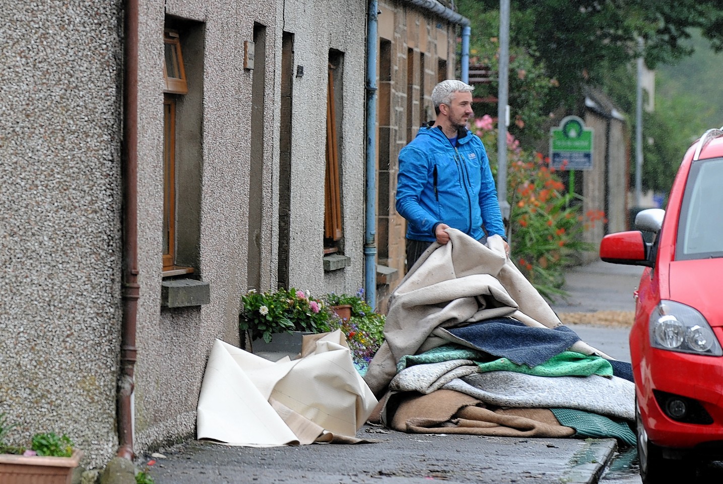 John Fielding outside his stricken Dallas home