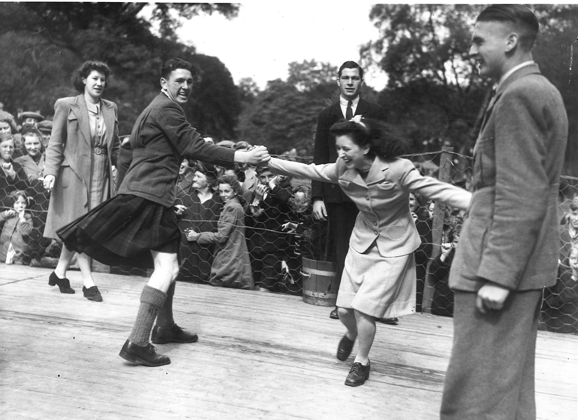 Stay at Home Holidays. Events were staged to help distract war woes. Fun during the eightsome reel at Hazlehead park summer 1942