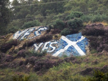 The saltire painted on The Sugar Loaf with yes mesages