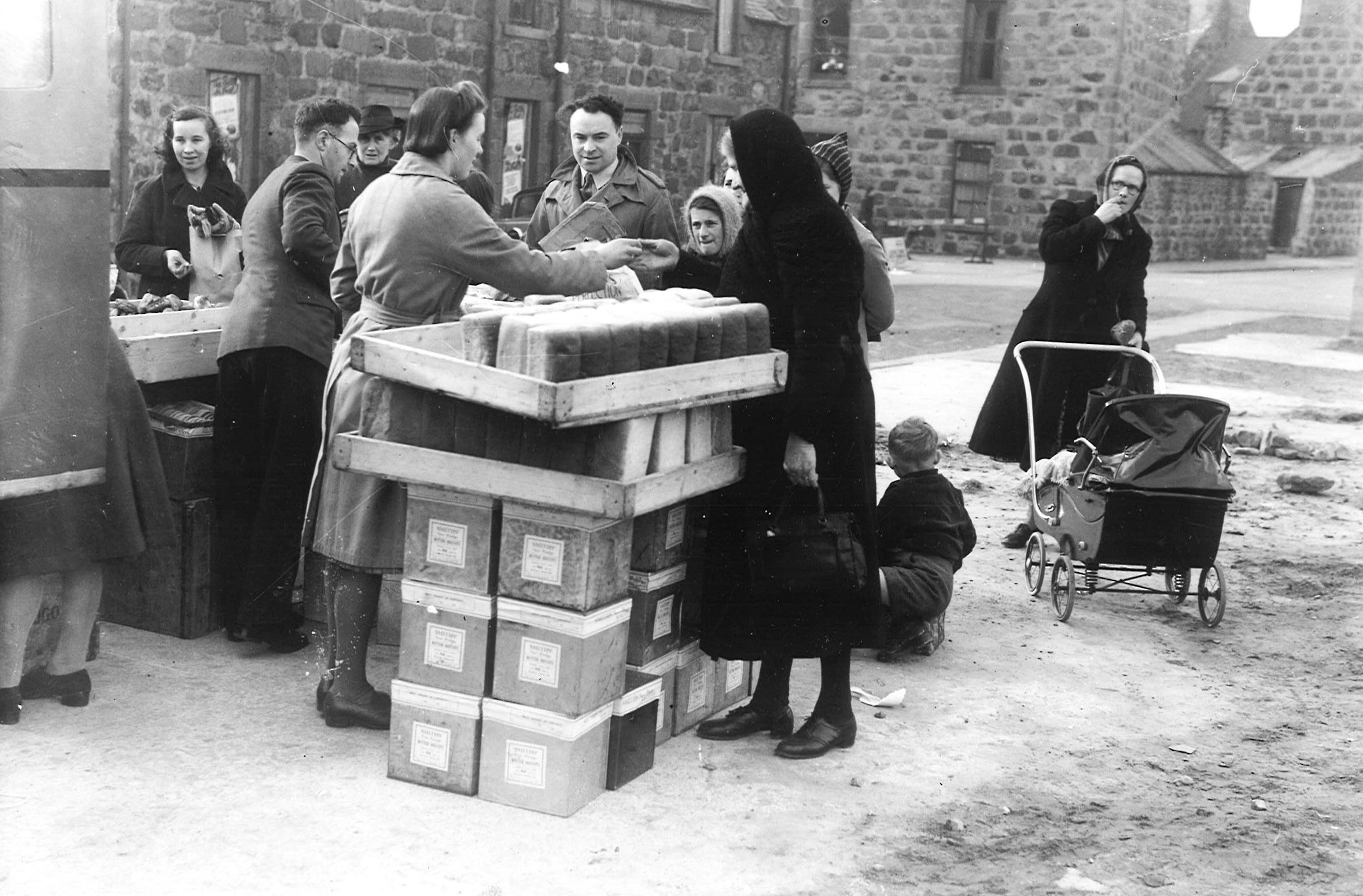 People in Fraserburgh buying bread from a van, September 1941