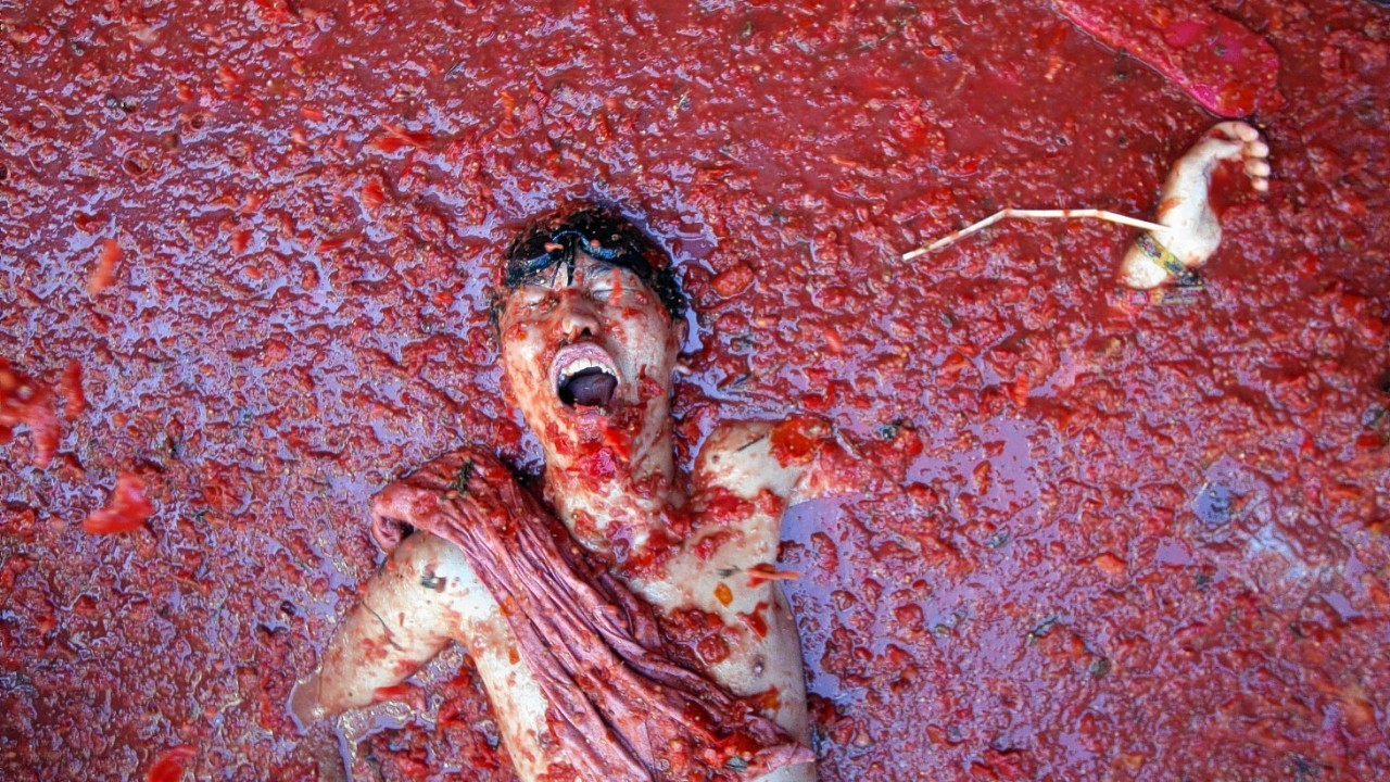 The annual "tomatina" tomato fight fiesta in the village of Bunol, 50 kilometers outside Valencia, Spain, Wednesday, Aug. 27, 2014