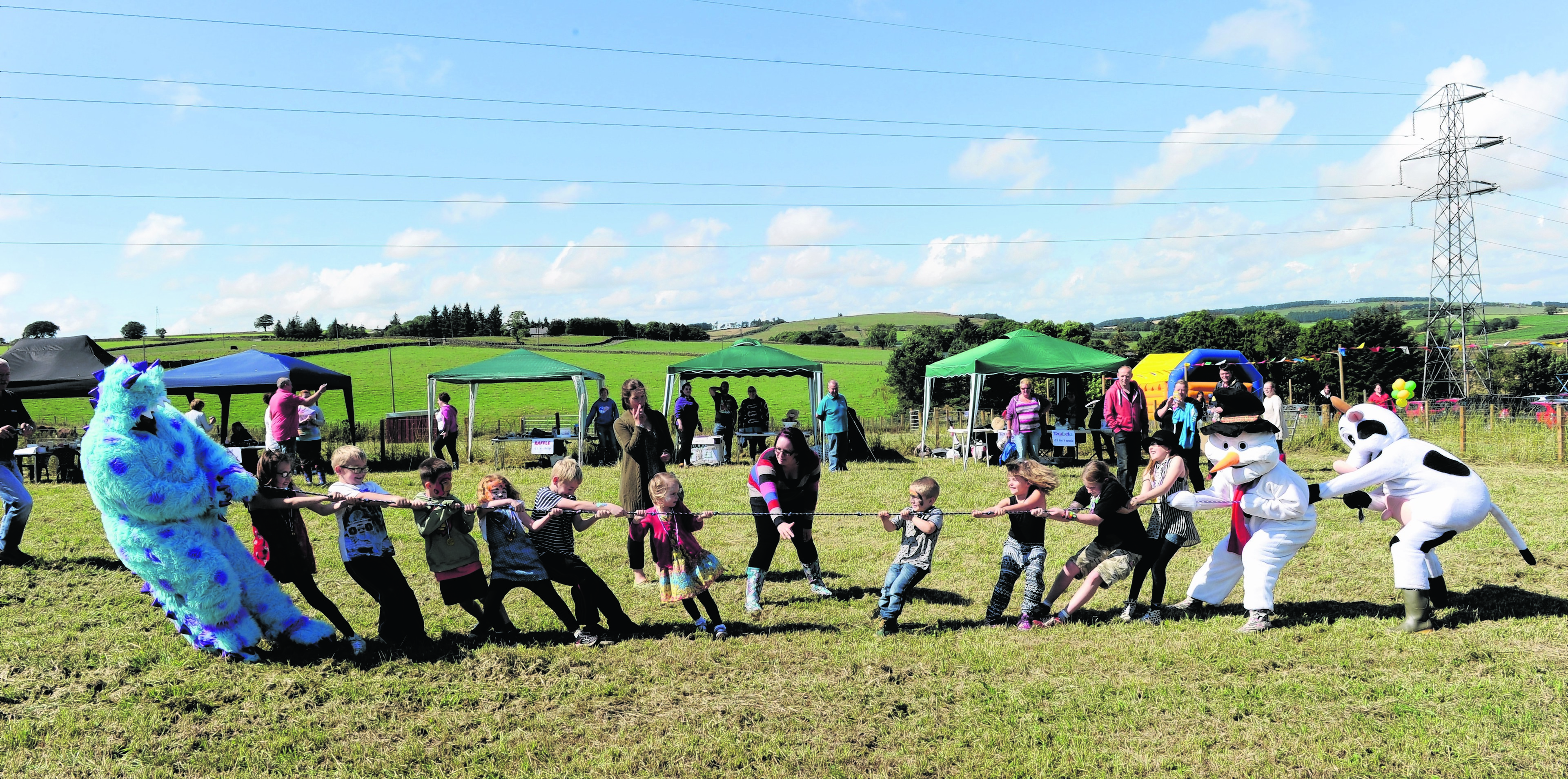 Tug o war at the Granite City Roller Girls' Mini Fete Day Fundraiser at Wynford Farm Café and Playbarn.