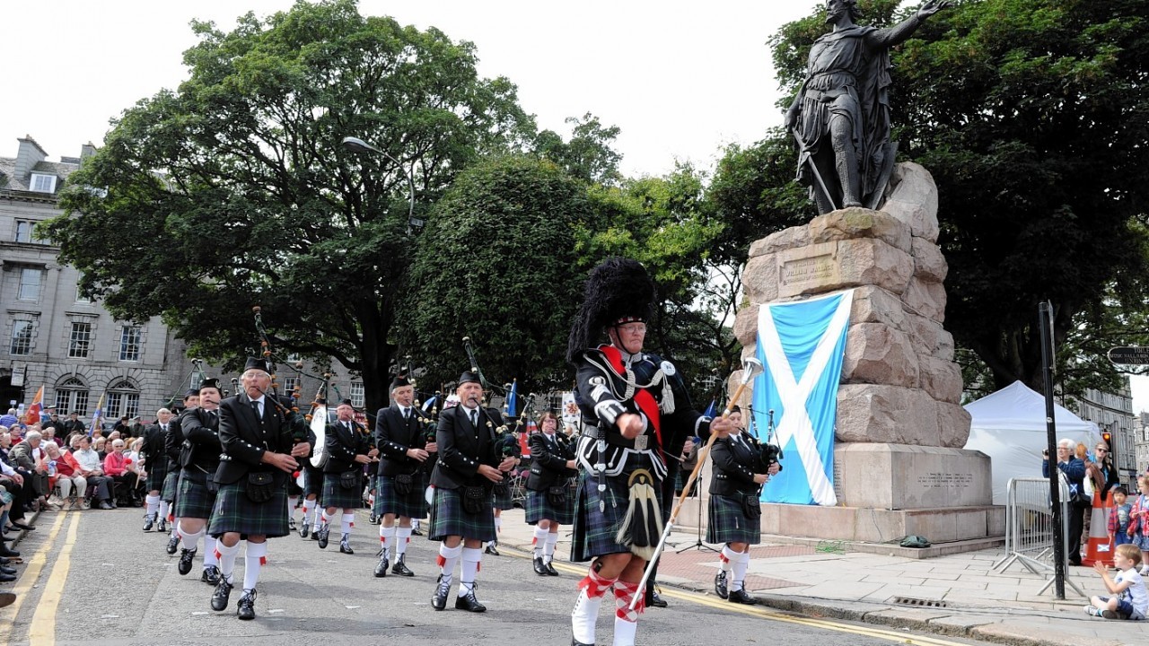 The annual Wallace Commemoration Ceremony at his statue on Schoolhill, Aberdeen.