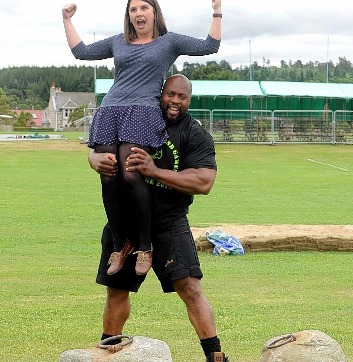 World Strongest Man competitor Mark Felix picks up P&J reporter Jessica Murphy