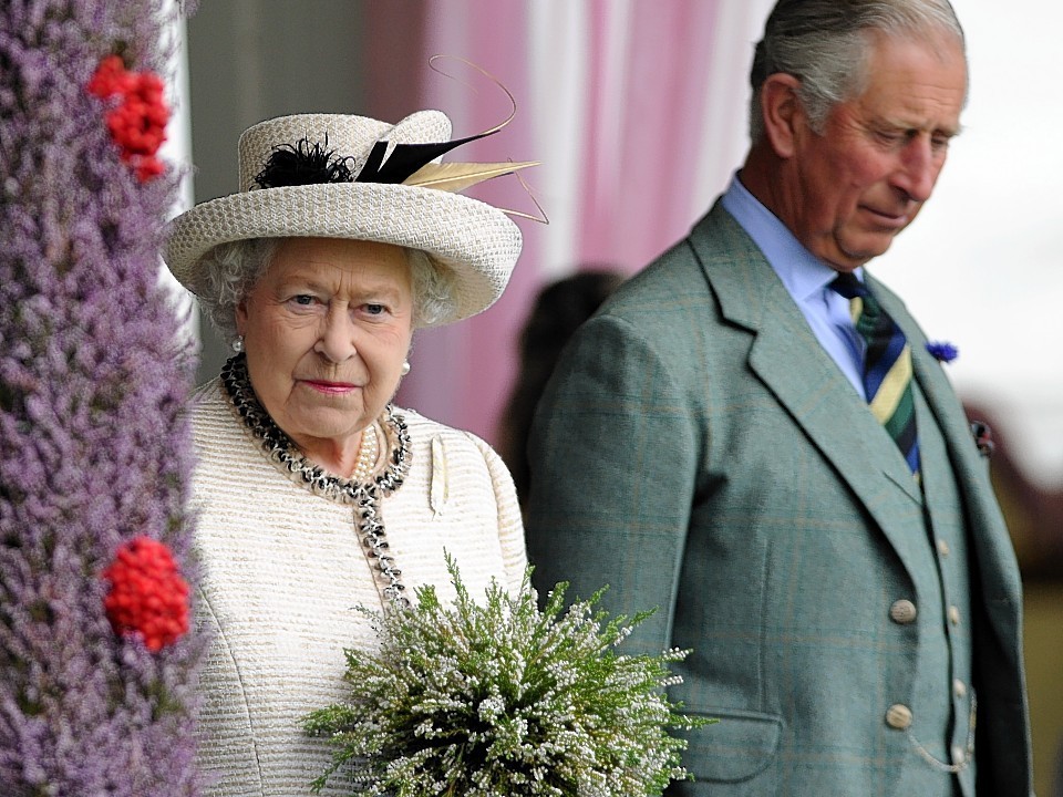 The Queen and Prince Charles attend the Braemar Gathering. Credit:  Kami Thomson.