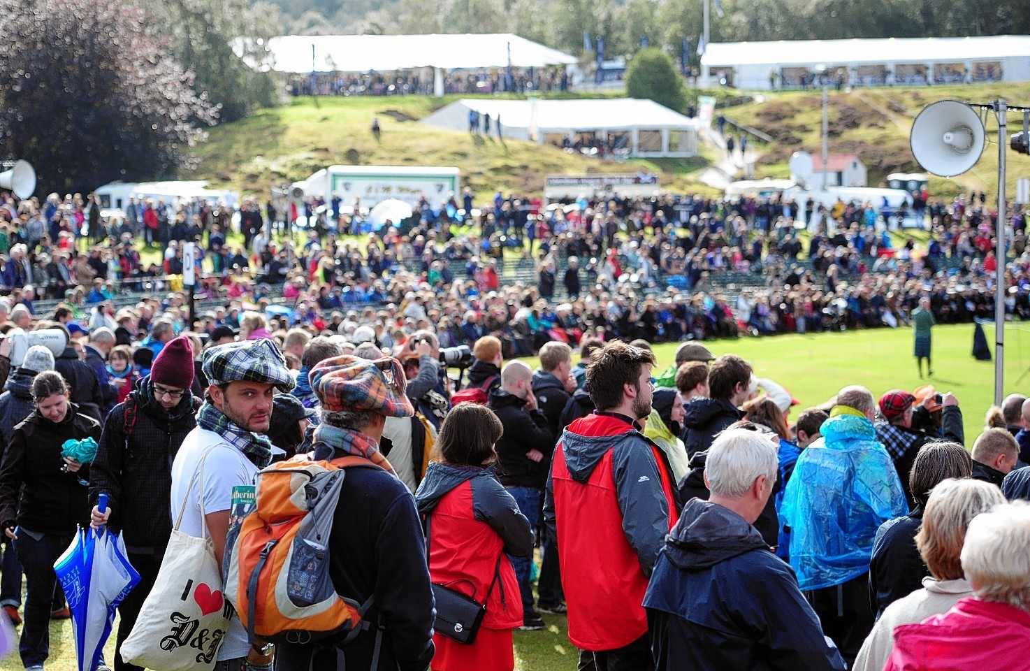 Sunshine bursts through at the Braemar Gathering. Credit: Kami Thomson.