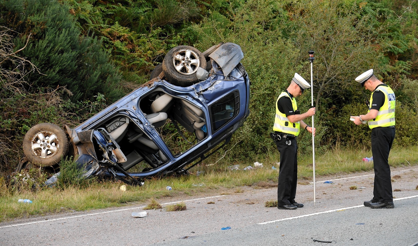 The woman's car overturned during the crash