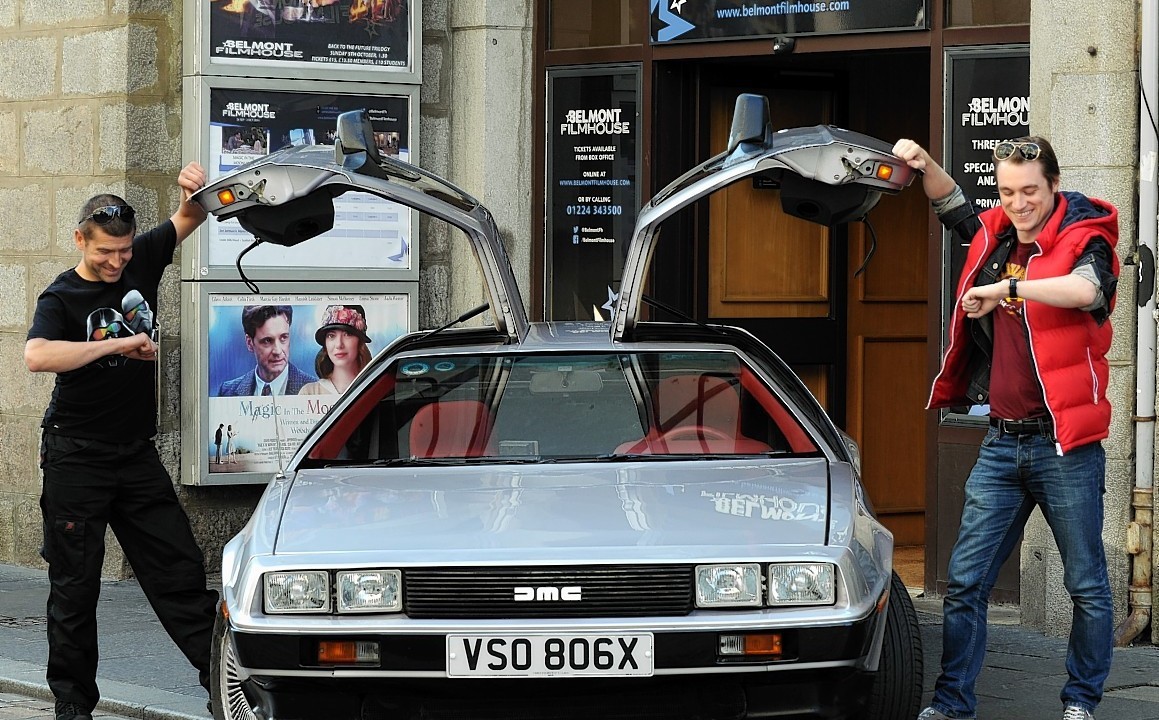 The DeLorean with its owner, Paul Mackie, and Belmont Filmhouse marketing and events manager, Dallas King, outside the cinema. Credit: Jim Irvine.