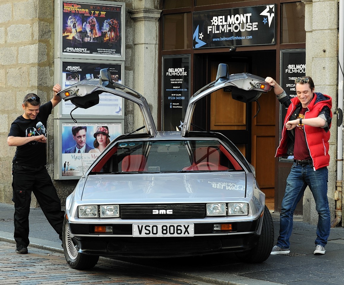 The DeLorean with its owner, Paul Mackie, and Belmont Filmhouse marketing and events manager, Dallas King, outside the cinema. Credit: Jim Irvine.