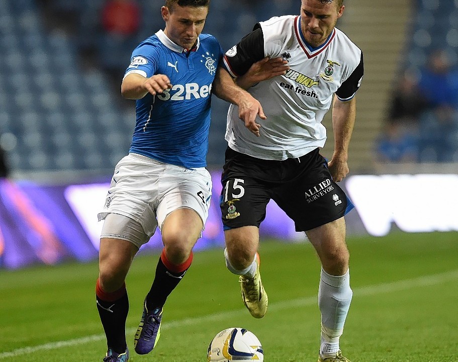 But then things started to get serious - Fraser Aird and Marley Watkins challenged for possession
