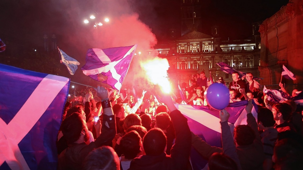 The independence supporters have brought colour to the George Square party with flares, balloons and flags