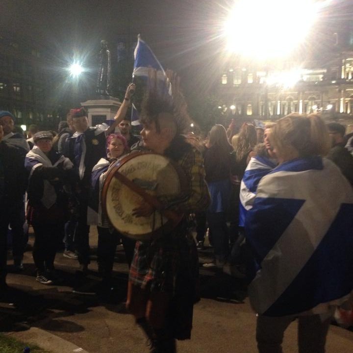 Other party goers have arrived at George Square armed with musical instruments