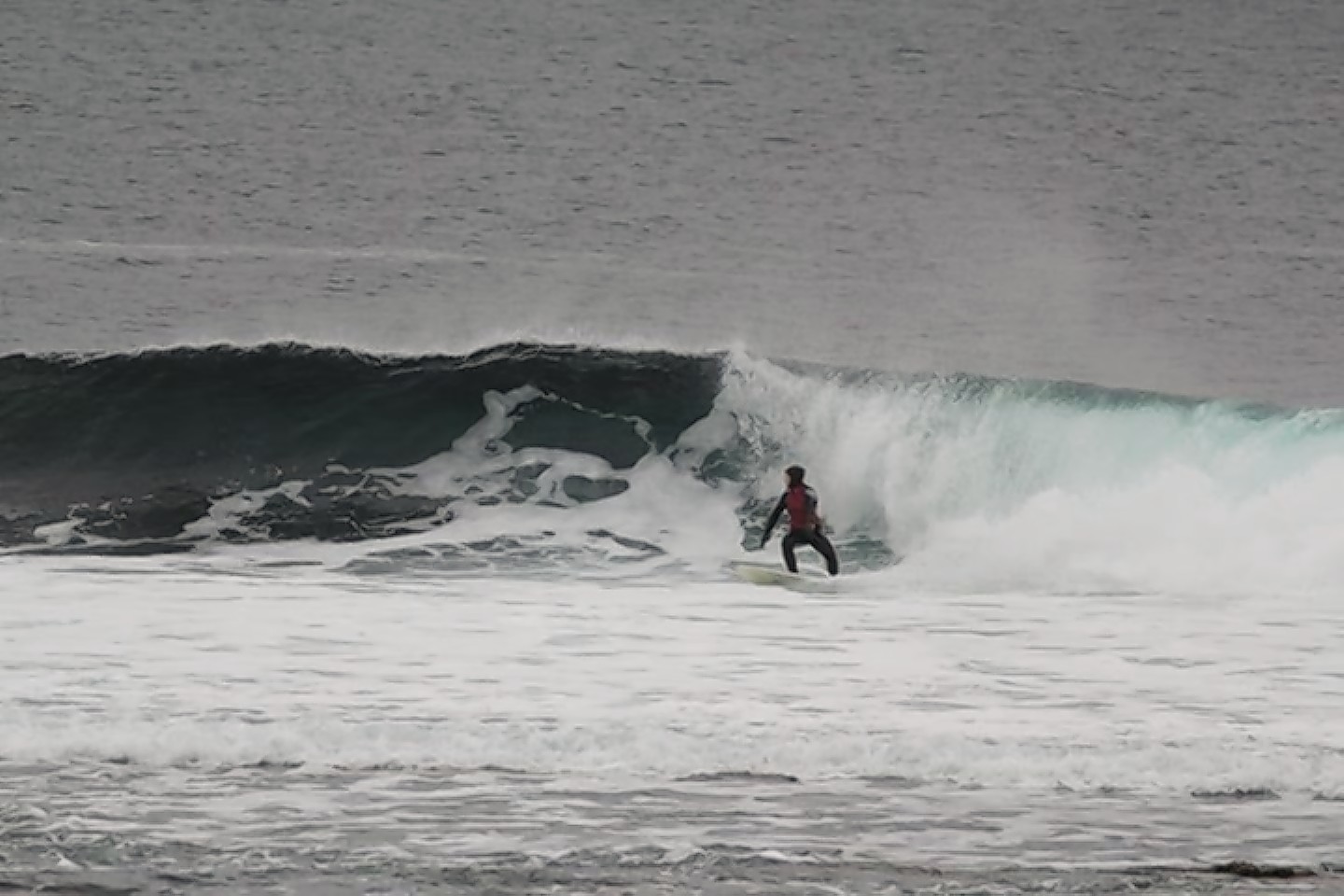 Surfer Jennifer Wood riding the waves near Thurso.
