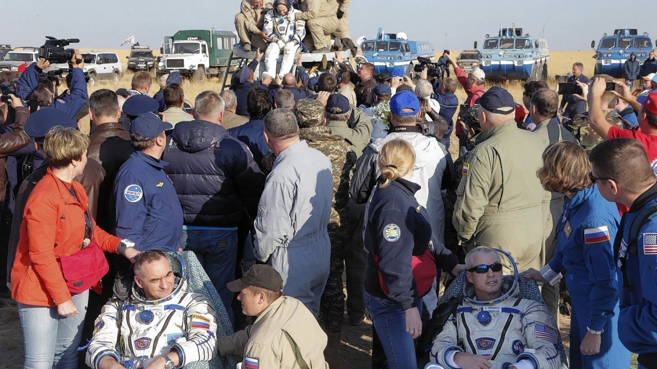 Russian cosmonaut , Oleg Artemyev,  Russian cosmonaut Alexander Skvortso, and US NASA astronaut Steven Swanson relax after landing from a  5 and a half months aboard the International Space Station.