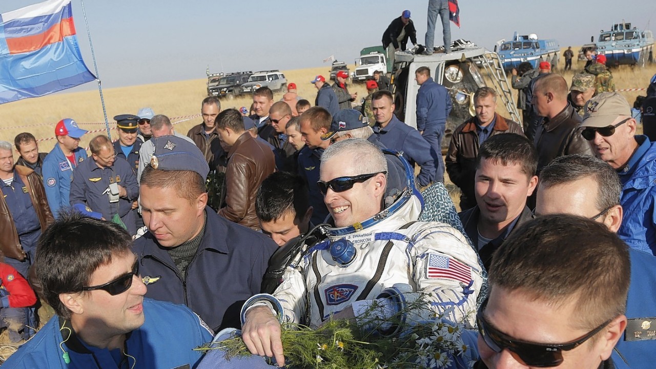 Russian cosmonaut , Oleg Artemyev,  Russian cosmonaut Alexander Skvortso, and US NASA astronaut Steven Swanson relax after landing from a  5 and a half months aboard the International Space Station.