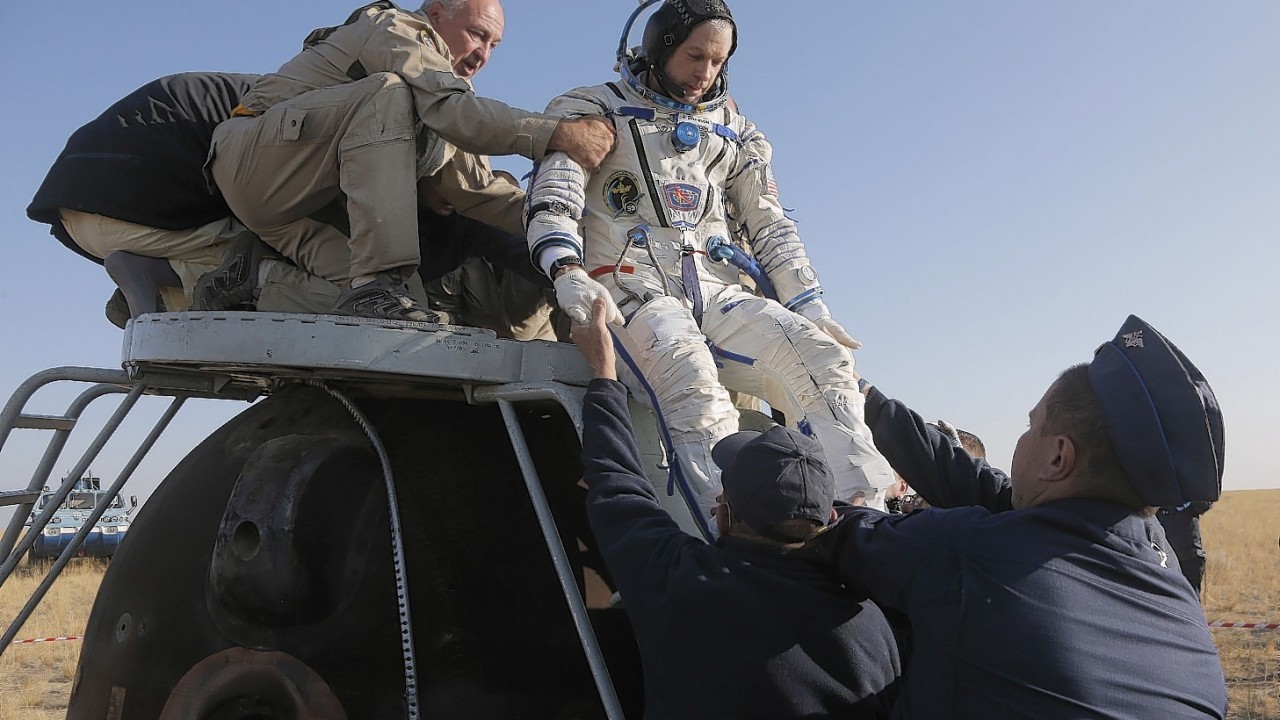 Russian cosmonaut , Oleg Artemyev,  Russian cosmonaut Alexander Skvortso, and US NASA astronaut Steven Swanson relax after landing from a  5 and a half months aboard the International Space Station.