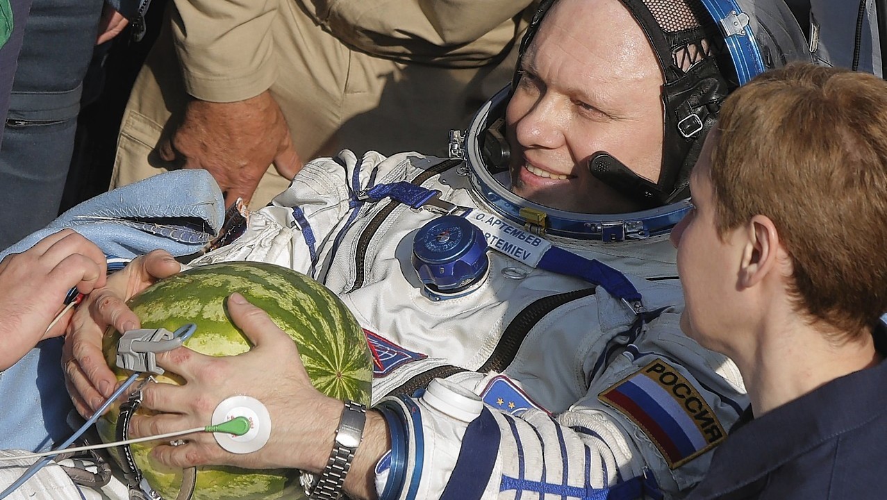 Russian cosmonaut , Oleg Artemyev,  Russian cosmonaut Alexander Skvortso, and US NASA astronaut Steven Swanson relax after landing from a  5 and a half months aboard the International Space Station.