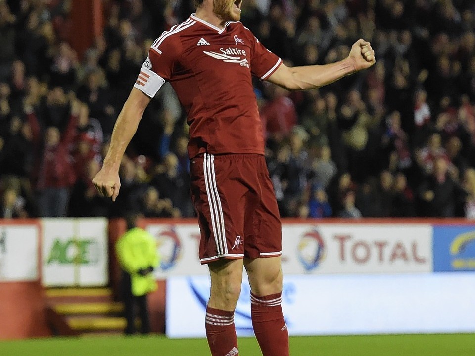 However, Dons eventually broke the deadlock in the dying seconds of the first period through an unlikely source as centre half Mark Reynolds fired them into the lead