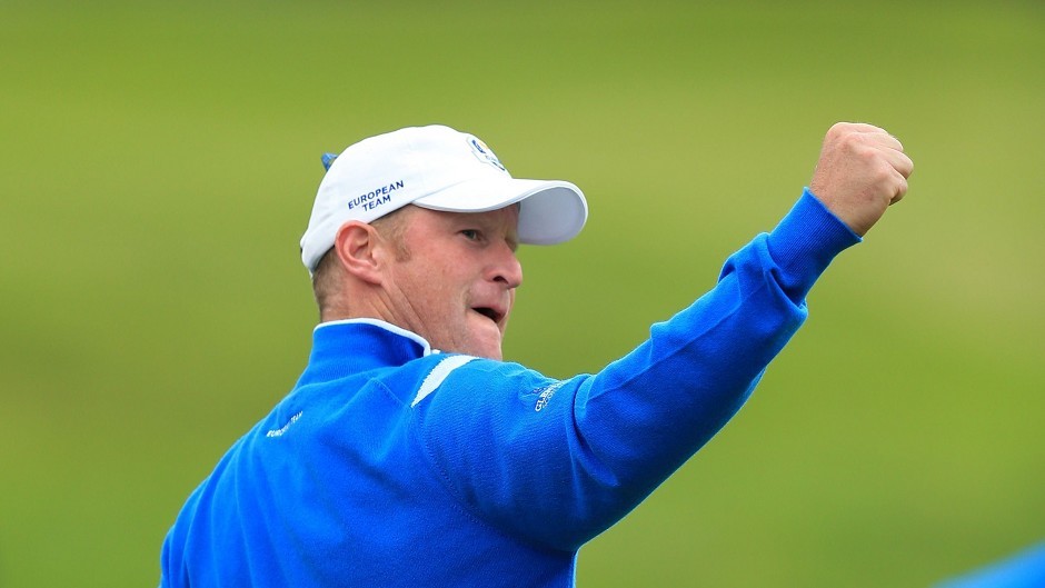 Jamie Donaldson celebrates during his Foursomes match