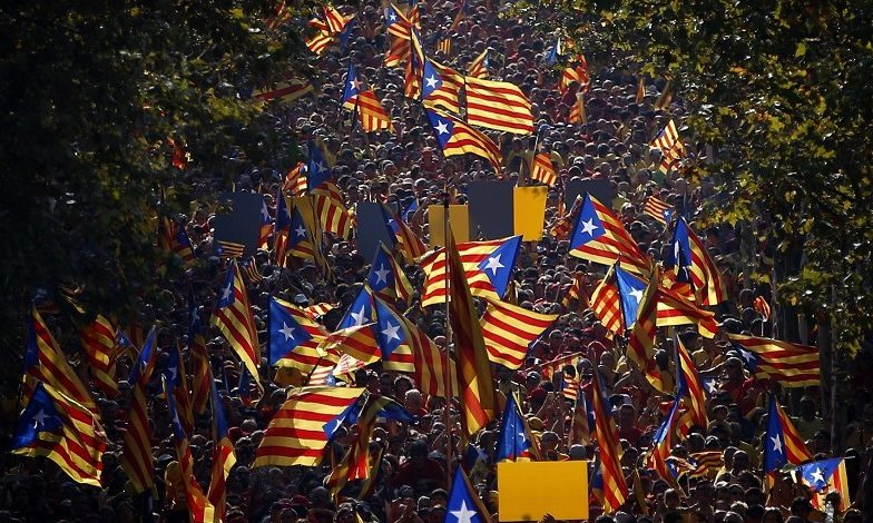 A demonstration calling for the independence of Catalonia marches in Barcelona.