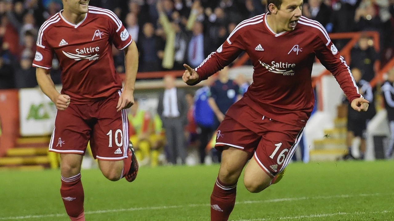 Peter Pawlett celebrates giving Aberdeen a 2-0 lead