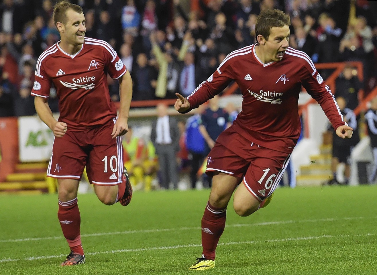 Peter Pawlett celebrates giving Aberdeen a 2-0 lead