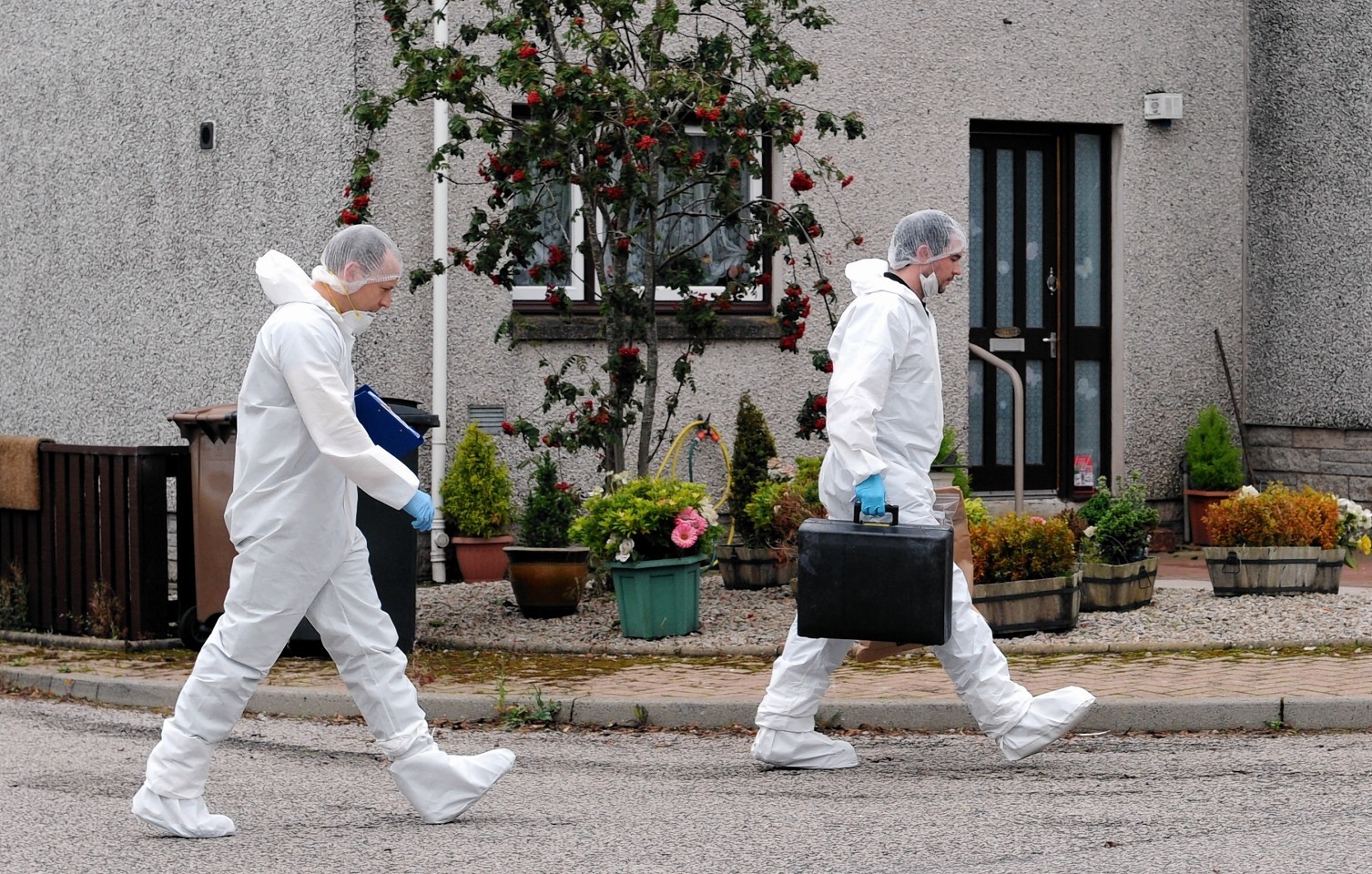 Police at the scene of the incident in Peterculter