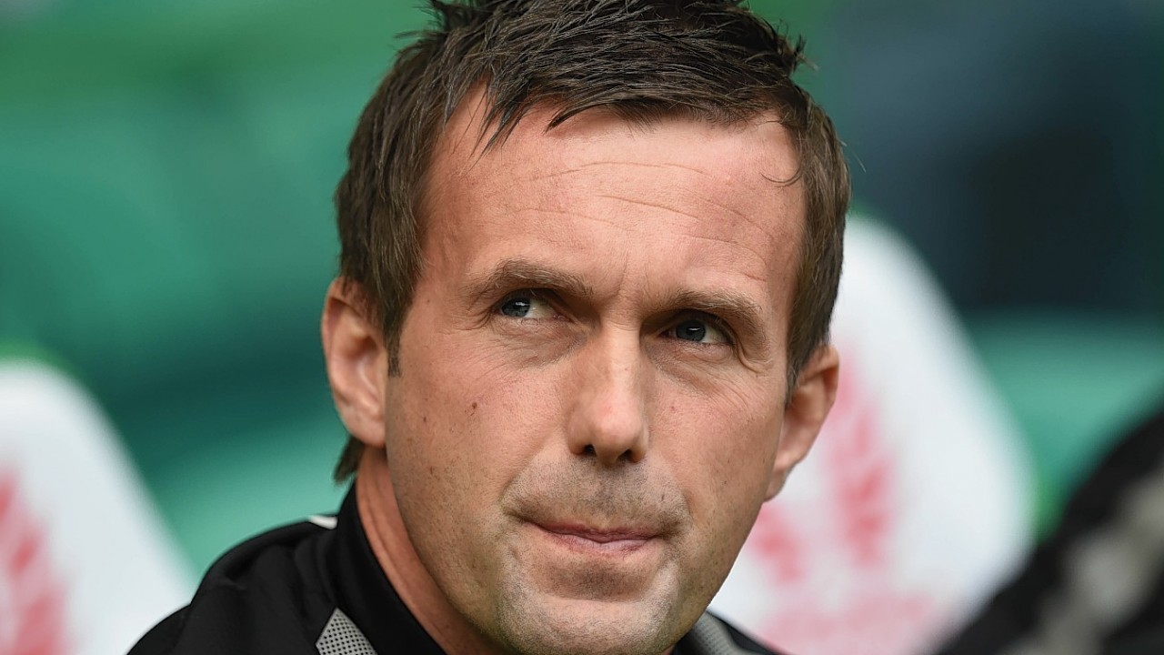 a tense looking Ronny Deila eventually celebrated a 2-1 victory for Celtic over Aberdeen