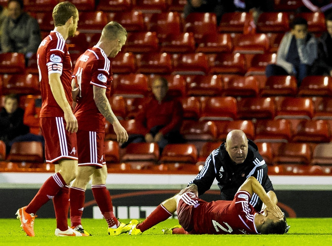 Jack required treatment on the Pittodrie pitch before he was stretchered off 