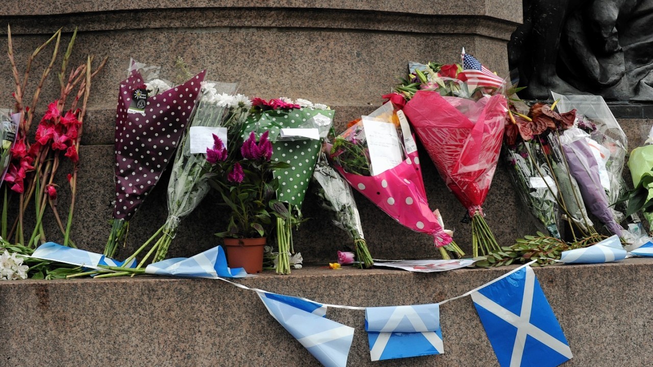 Tributes for the piper, William Daniel, who played at the Edward V11 statue at Union Terrace, Aberdeen.