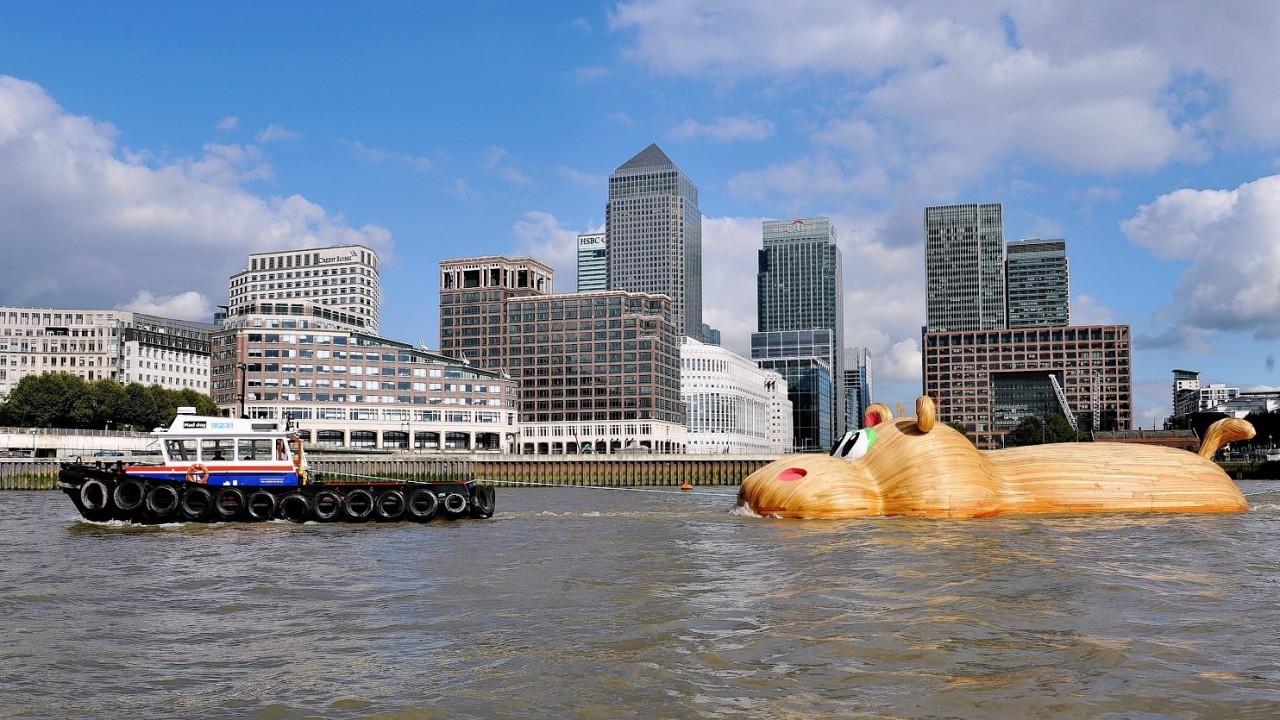 Dutch artist Florentijn Hofman's first ever UK commission 'HippopoThames' is towed along the River Thames