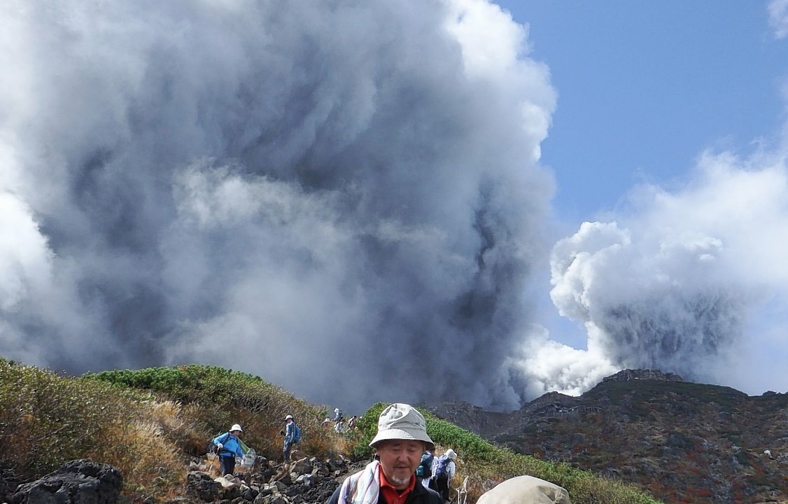 Plumes of smoke and ash billow from Mount Ontake as it continues to erupt in central Japan, Sunday, Sept. 28, 2014