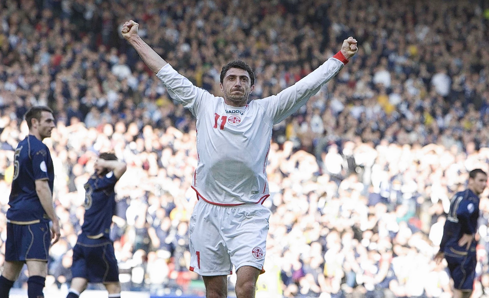 Shota Arveladze celebrates scoring against Scotland at Hampden