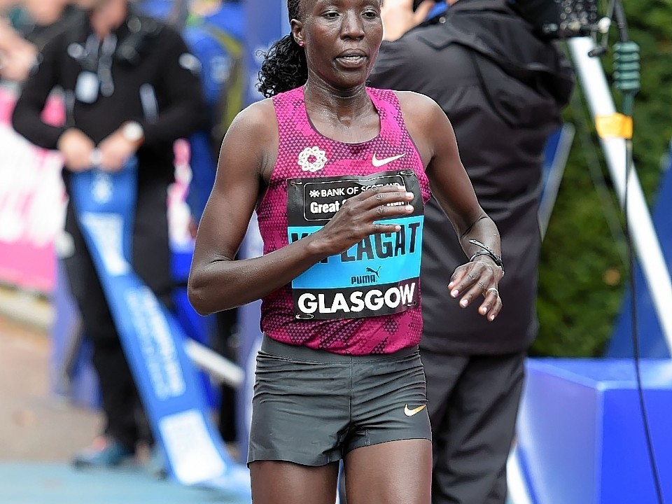 Kenya's Edna Kiplagat was the first female to finish the half marathon