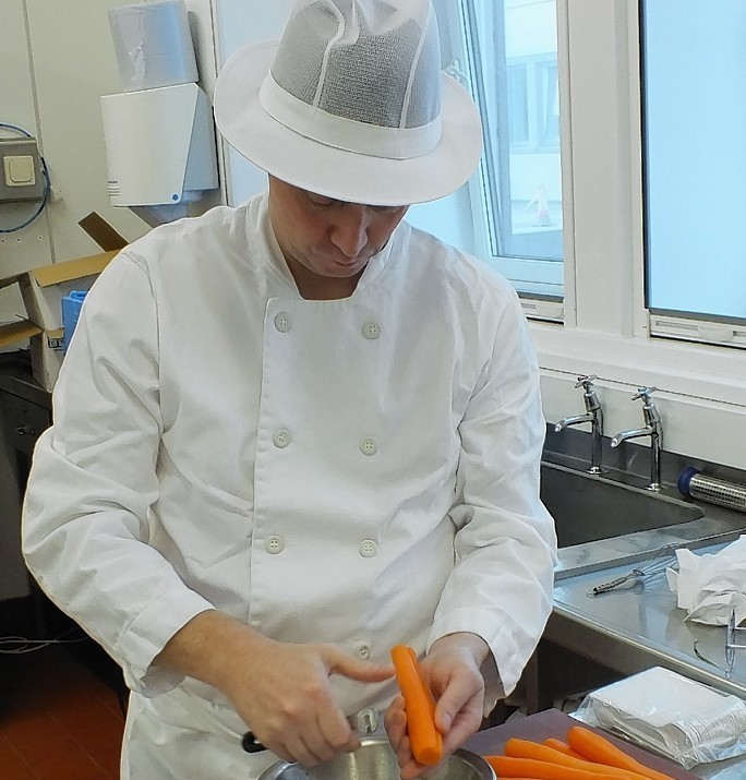 Graham Stewart prepares food