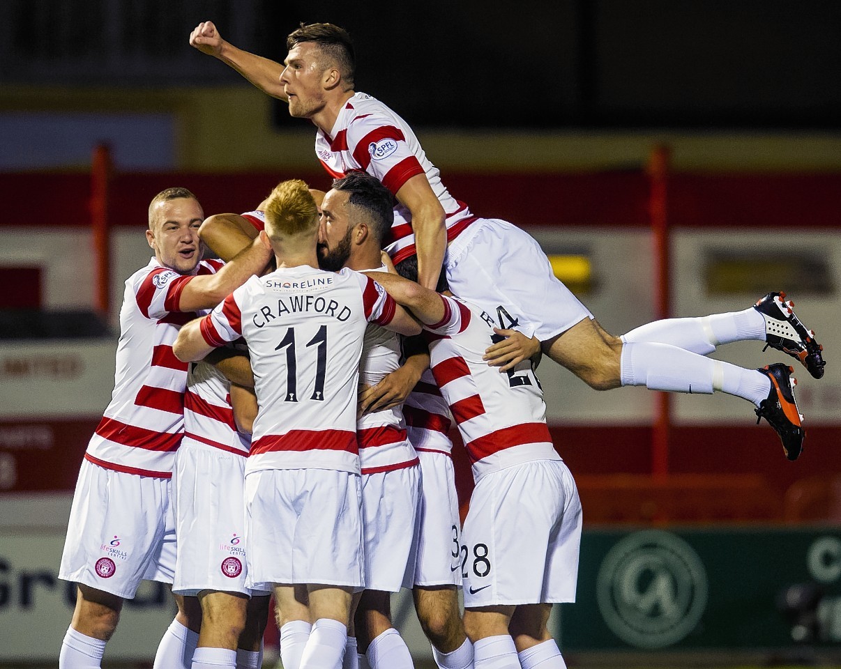 Hamilton Accies celebrate their recent victory over the Dons