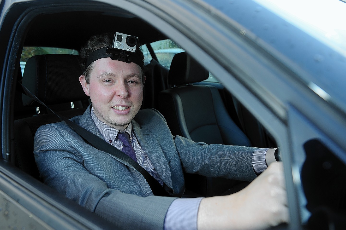 Martin Little dons a head-mounted camera to film the progress of his journey on the A9 yesterday