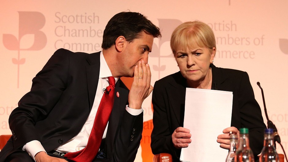 Labour leader Ed Miliband speaking to Scottish Labour leader Johann Lamont back in August
