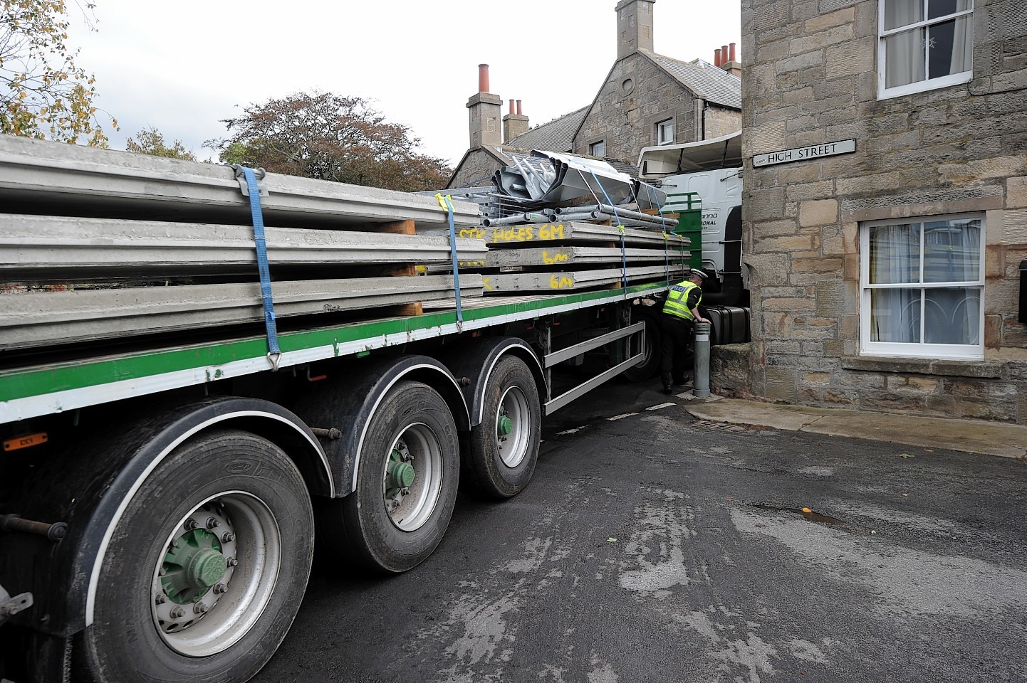 Pictures show the trail of destruction left by the lorry in the tiny village