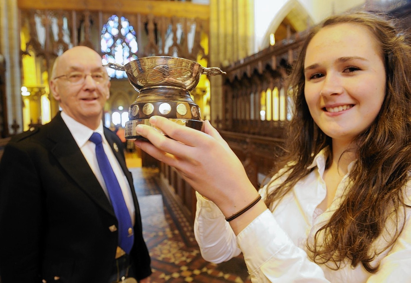 John Macleod presents solo singing award to Isabelle Bain